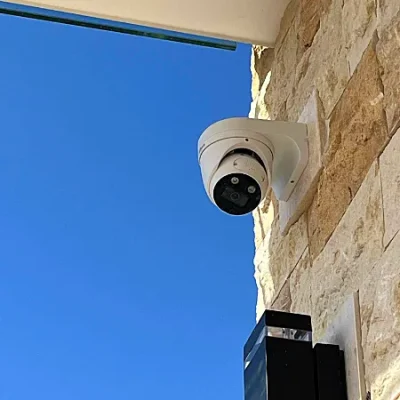 CCTV camera against sky